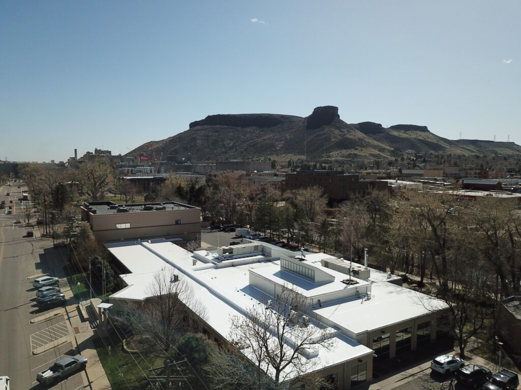 aerial view of roof top with table mountain in the background