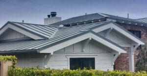 gray standing seam steel metal roof on a residential home that wanted more durability vs shingles