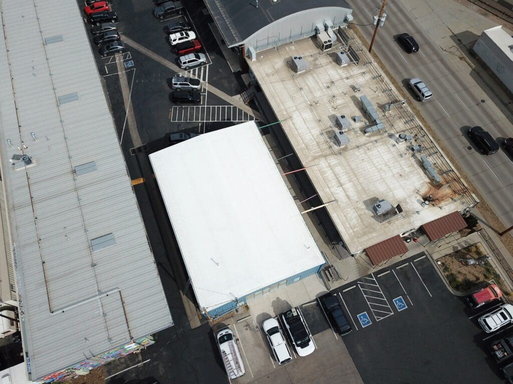 aerial view of a white TPO commercial flat roof repair project in Denver, Colorado
