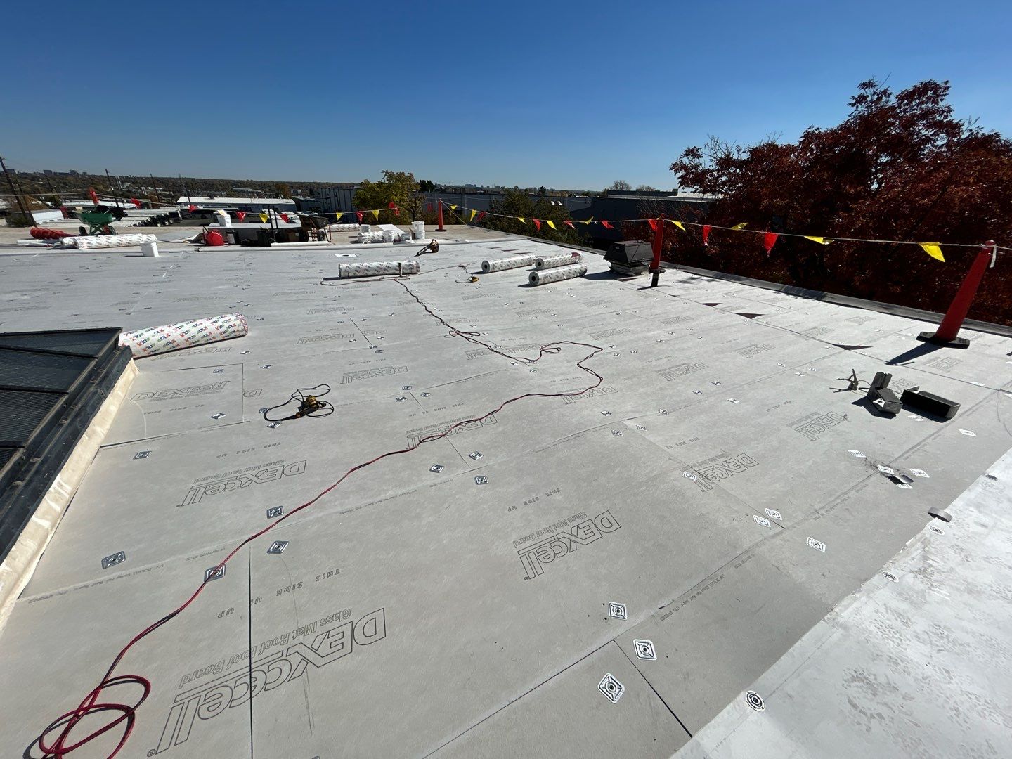 in progress repair of a PVC DuroLast flat roof in Denver, Colorado done by Table Mountain Roofing company